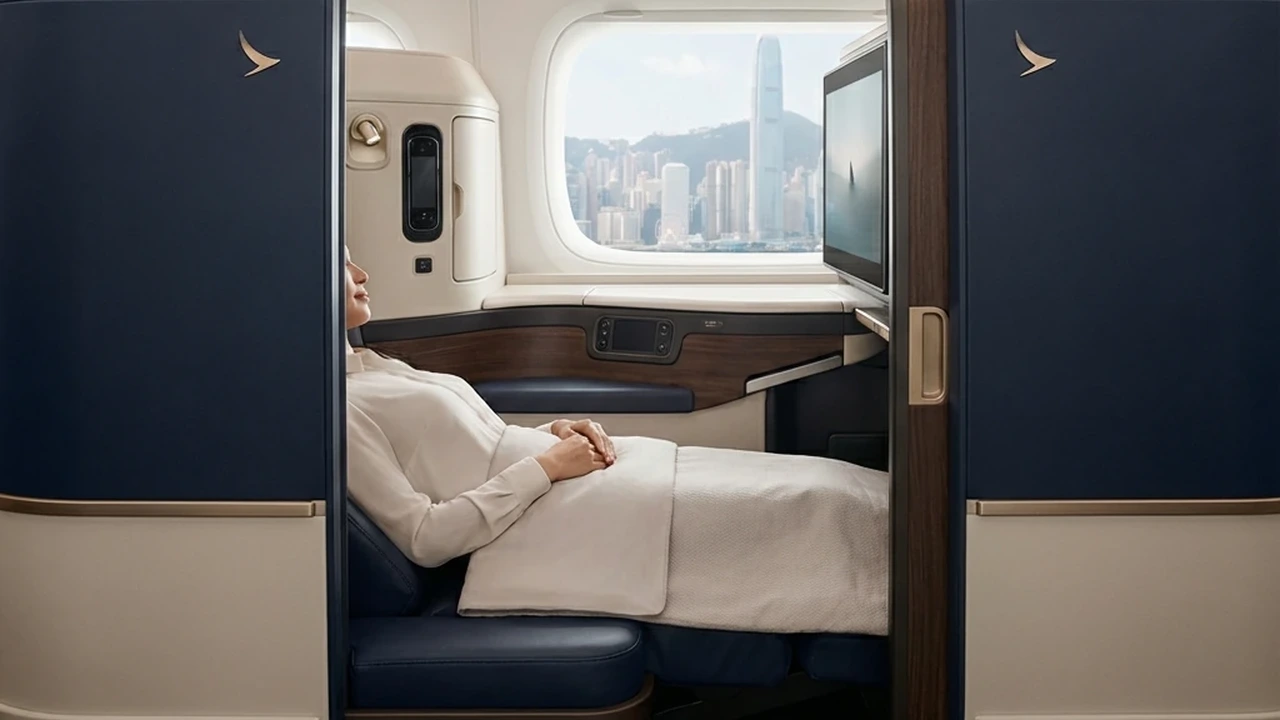 Cathay Pacific Aria Suite business class cabin with ambient lighting