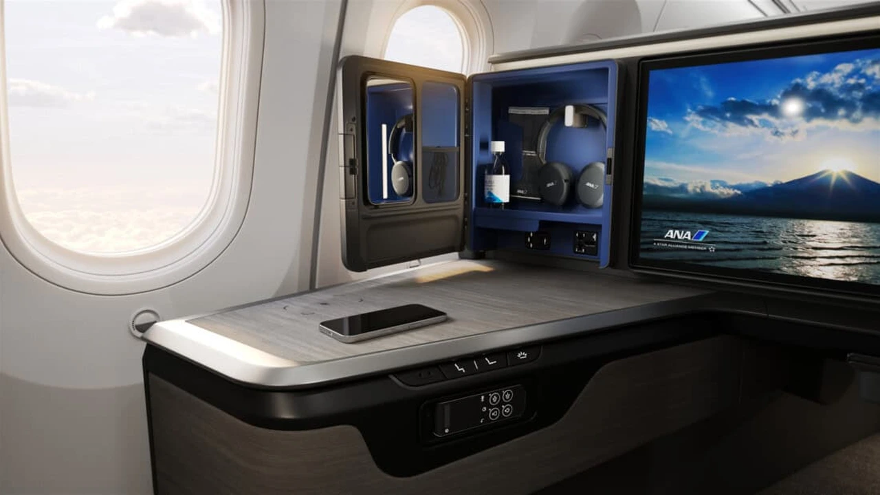 ANA The Room side console, charging ports, and personal storage