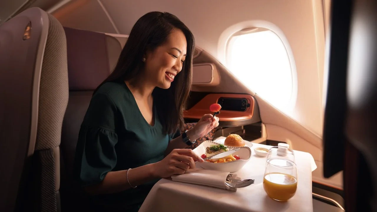 Singapore Airlines Business Class multi-course meal service