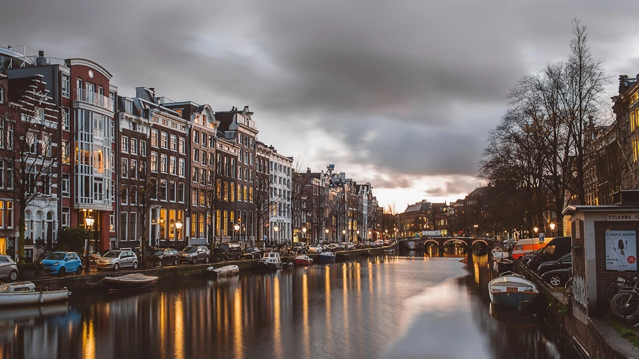 Picturesque canals and historic bridges of Amsterdam in early autumn