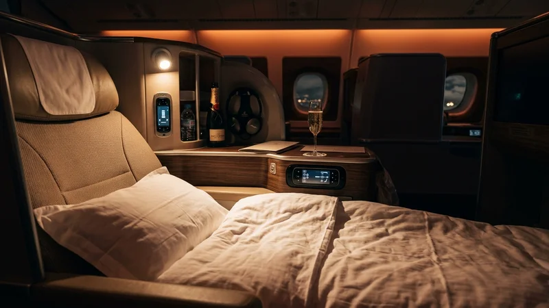 Business class lie-flat seat with bedding