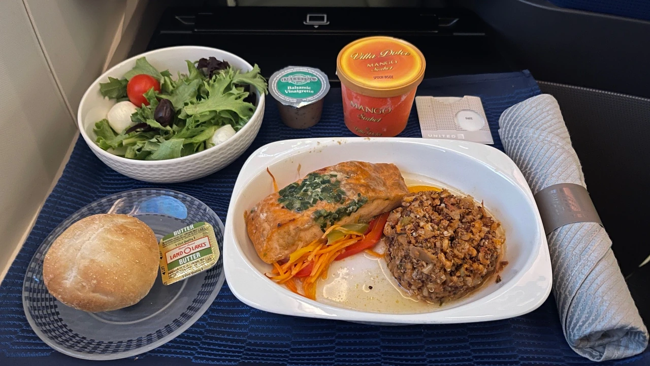 United Polaris meal service with Saks Fifth Avenue bedding
