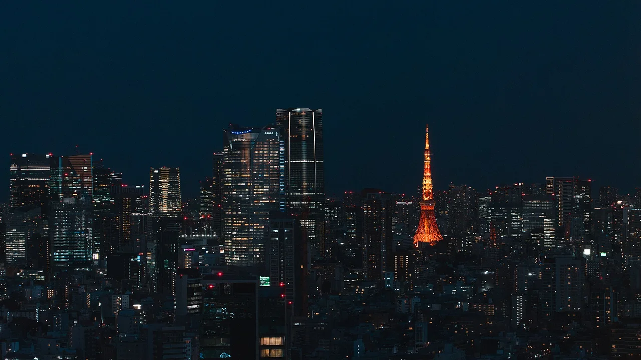Tokyo skyline illuminated at night with Tokyo Tower