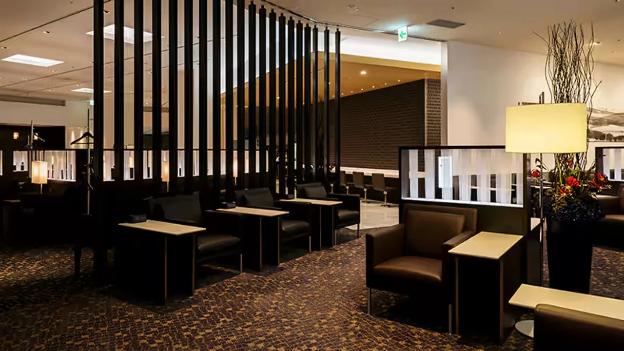 ANA Business Class priority check-in area with dedicated lanes and blue carpets