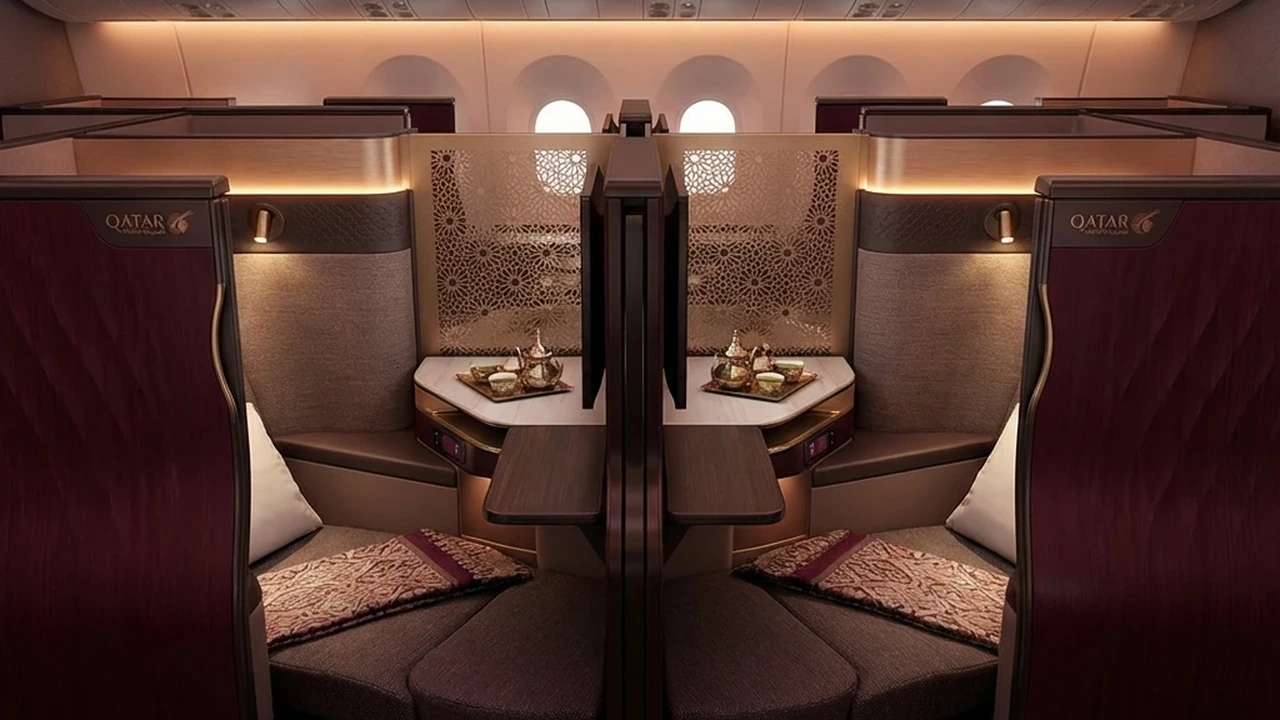 Qatar Airways multi-course dining service on fine tableware